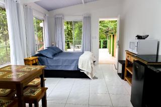 Jubate Chalés | Conforto à beira da cachoeira - 9