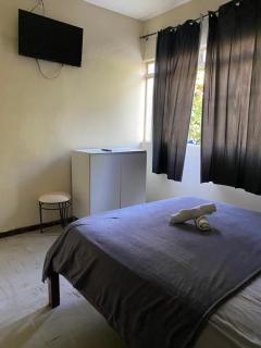 Quarto simples no centro - 1