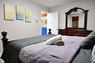 Modern 4BR Lake Escape with Patio & BBQ Area - 9