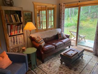 Cabin in the woods with fire pit and porch - 0