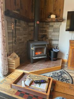 Cabin in the woods with fire pit and porch - 1