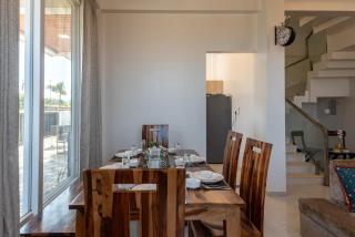 ELIVAAS White House 4-BHK Villa with Panoramic Hill Views, Glass Room, Outdoor Pool & Dam nearby - 1