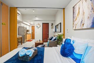 FREE Welcome Breakfast, BGC 1BR, 300Mbps Fiber, Steps to Mitsukoshi & Uptown, 15J - 4