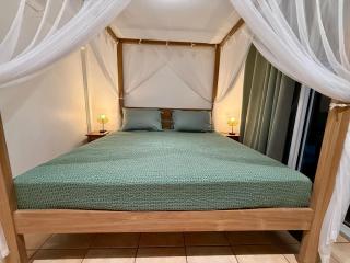 Lodge Orchidée de la Villa La Palmira - Vue Mer Caraïbes - Jacuzzi Privé - Accès Piscine 5x9 - Lit King Size 180 - Climatisation - 4 étoiles - Proche commodités - TV connectée - Internet fibre - Proche Plage - 3