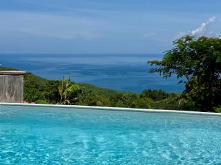 Lodge Orchidée de la Villa La Palmira - Vue Mer Caraïbes - Jacuzzi Privé - Accès Piscine 5x9 - Lit King Size 180 - Climatisation - 4 étoiles - Proche commodités - TV connectée - Internet fibre - Proche Plage - 8