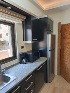 روف طابق ثاني تشطيب فندقي باطلاله ساحرة بعمارة عائلات بعبدون الشمالي - 1