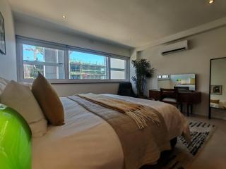 Newly renovated 2 bedroom, central, secure, ACs and work setup - 2