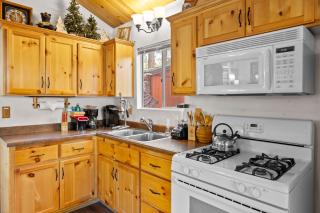 Romantic Getaway - Cozy and beautifully wooded getaway cabin with Hot Tub and a Fenced Yard! - 5