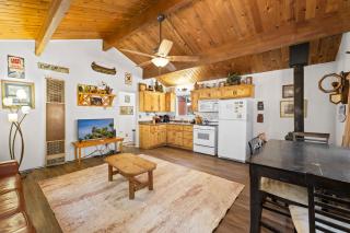 Romantic Getaway - Cozy and beautifully wooded getaway cabin with Hot Tub and a Fenced Yard! - 4