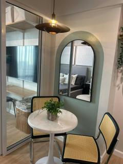 Cozy Designer Studio at Acqua Private Residences - 1