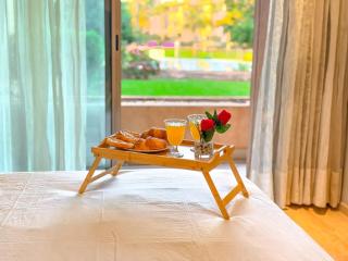 Prestigia Topaze- Terrace overlooking garden & pool - 4