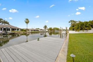 Updated Waterfront Pool Home with Putting Green - 6