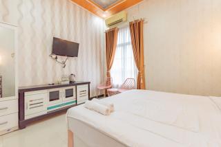 Urbanview Hotel Rifal Home Tegal - 6