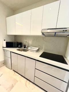 Estudio 104 en Distrito Puerto - 3