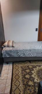 Quarto individual em casa compartilhada com ar condicionado - 9