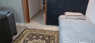 Quarto individual em casa compartilhada com ar condicionado - 7