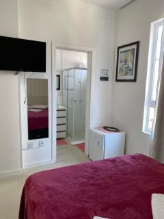 Suíte 1 com cama de casal,em apartamento compartilhado ar condicionado, tv, e Wi-fi -frigobar - 5