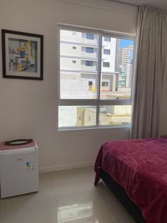 Suíte 1 com cama de casal,em apartamento compartilhado ar condicionado, tv, e Wi-fi -frigobar - 9