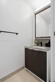 Modern Townhouse Luxe Walk-In Closet- 65 TV - 4