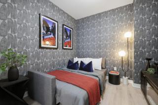 Modern Townhouse Luxe Walk-In Closet- 65 TV - 3