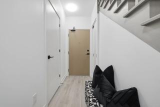 Modern Townhouse Luxe Walk-In Closet- 65 TV - 1