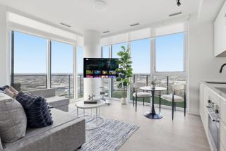 Modern 2BR Retreat with Patio & Parking - 1