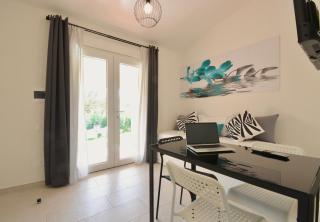 ISA - Residence in Costa Rei just 450 meters from the beach, apartments with air conditioning and outdoor private area - 1