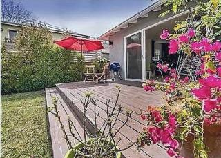 Stylish Three-Bedroom Coastal Home With Private Yard - 0