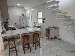 Escolha entre Cobertura com piscina interna 190m2 e o outro Apto Tipo tendo 95m2 Praia Bertioga - 2