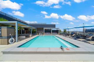 Top-Floor Gem & Heated Pool Walk to Attractions - 4