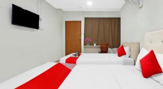 OYO 90873 Travellers Inn - 7