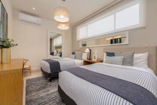 Stylish and Modern New 2BR Condo with Ocean Views - 7