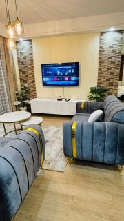 stunning two bedroom apartment with heated swimming pool fully equipped gym ample parking space and a relaxing rooftop with breathtaking views - 1