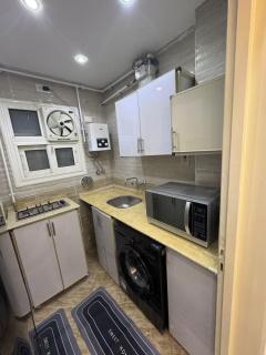 Modern Furnished 2BR Home First Use in Madinaty - 9