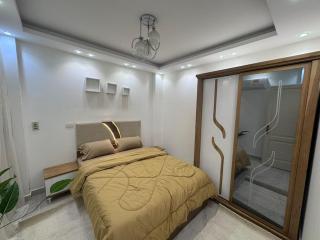 Modern Furnished 2BR Home First Use in Madinaty - 5