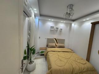 Modern Furnished 2BR Home First Use in Madinaty - 4