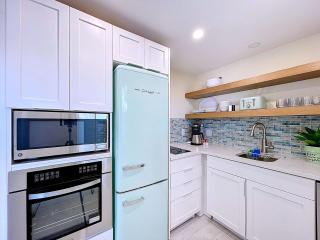 Seas The Day from this updated 2 bed 2 bath steps to beach - 5