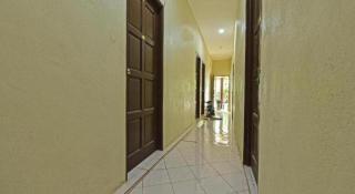 OYO 90596 Casaria Inn - 8