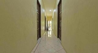 OYO 90596 Casaria Inn - 3