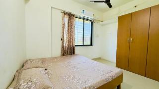 Bhakti Bliss Homestay - 1BHK modern Apartment with AC, Wifi and Android Tv- 2mins from Highway - 1