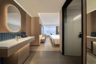 Huanman Hotel Qingdao Zhanqiao Zhongshan Road Metro Station Branch - Qingdao - 5