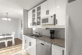 Chic & Spacious 2BR at Stampede with Parking, AC - 3