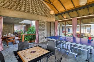 SaffronStays Ashfield - 5BHK Eco-Farmhouse with Pools, Jacuzzi, Lawn & Games Room - 4