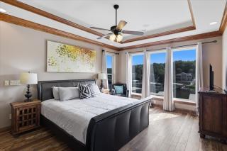 Porto Cima w/ Game Room, Dock, Boat Slip, Kayaks, Lakeside Fireplace & Hot Tub - 8