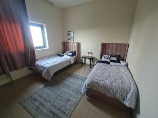 A bedroom a kids room a living room and two bathrooms - Sharjah - 8