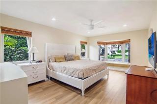 Elegant Three-Bedroom Waterfront Estate With Private Dock and Pool - 1