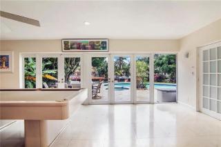 Elegant Three-Bedroom Waterfront Estate With Private Dock and Pool - 6