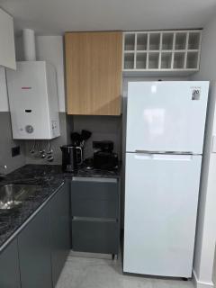 Catamarca y España, a estrenar, a metros del RIO, con cochera en el edificio - 4