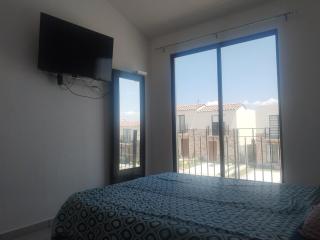 House A in a residential condominium with a pool - 4