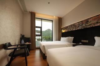 Zhangjiajie JIMO Hotel--New Hotel,Exclusive Location,Free Drop off Service to East Gate of forest park,Free Self-Service Laundry & Drying, Attraction Tickets Serivce in advance - 4